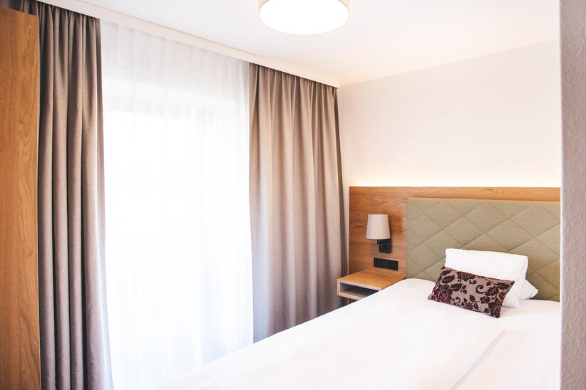Doppelzimmer im Dolomitenhof Tristach in Osttirol {images.alternative'}