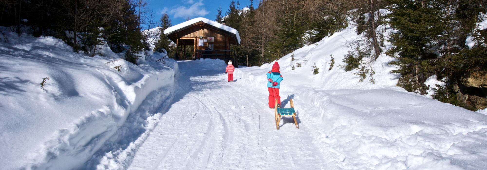 Tobogganing on the Tilliachalmweg, Außervillgraten | © TVB Osttirol / Weitlaner Jakob